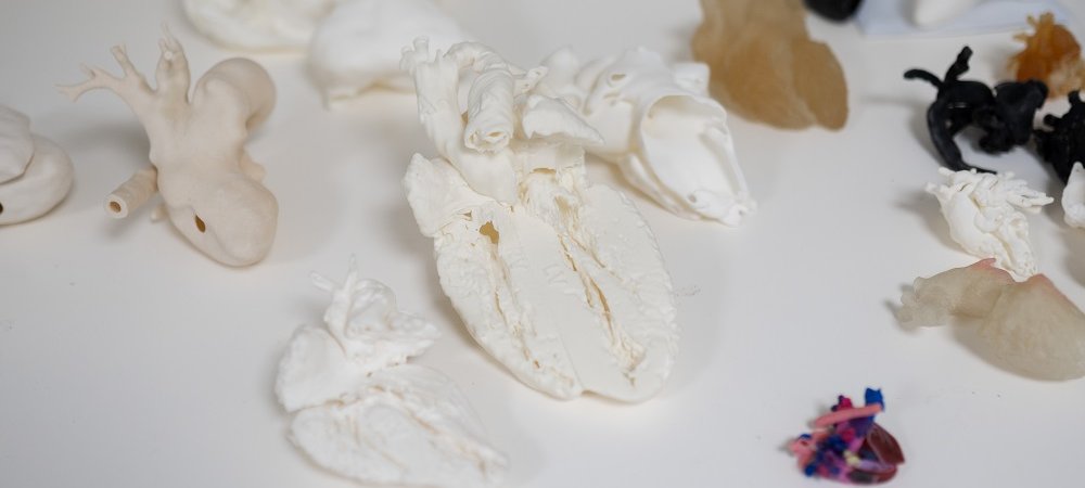 A collection of 3D printed hearts in different colours and sizes