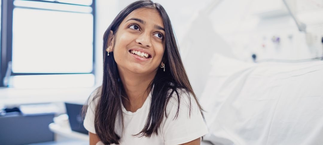 Patient Aisha smiling