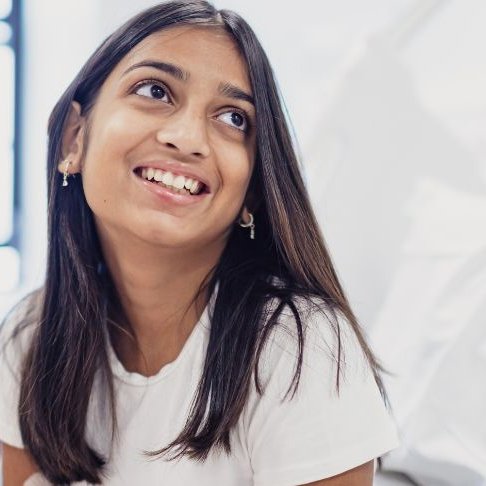 Patient Aisha smiling