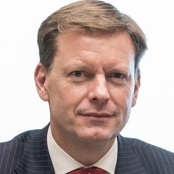 A portrait of Trustee Andrew Stoker.