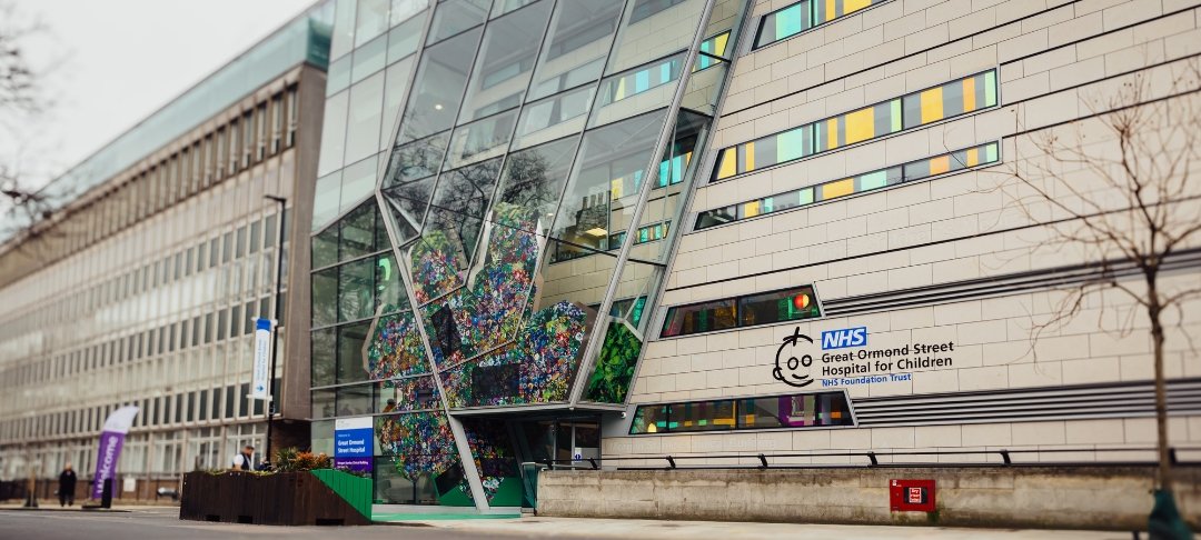The Morgan Stanley Clinical Building entrance, on Guilford Street, covered in artwork commissioned by GOSH Arts.
