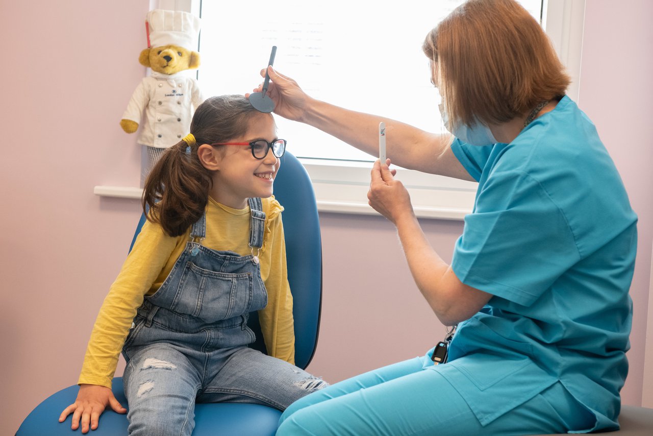 GOSH patient Beth with Bronwen Walters, the hospital's Head Orthoptist