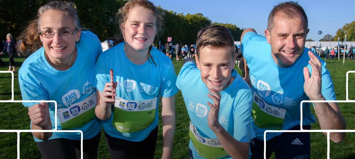 A mother, daughter, son and father smile at the camera and pose like they are about to start Race for the Kids.