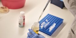 Close-up of researcher carrying out experiment