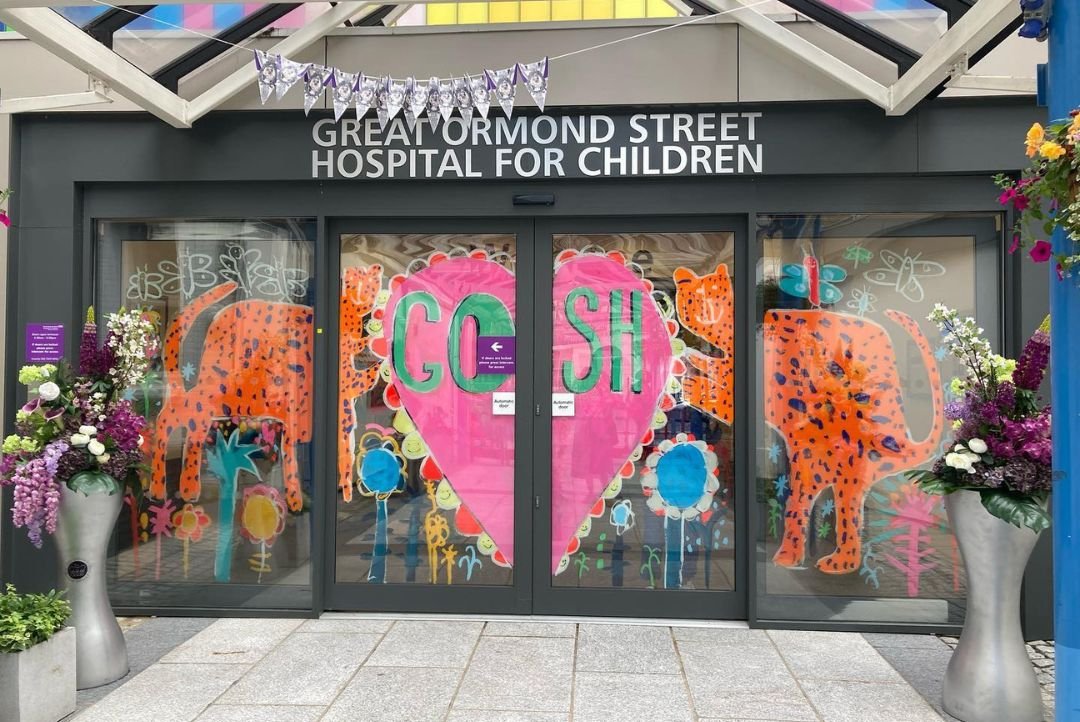 illustration of tigers and heart on GOSH entrance sliding doors